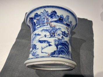 A fine Chinese blue, white and copper red 'Master of the Rocks' brush pot, Kangxi